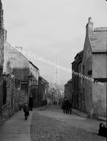 STREET SCENE WITH SHANDON STEEPLE